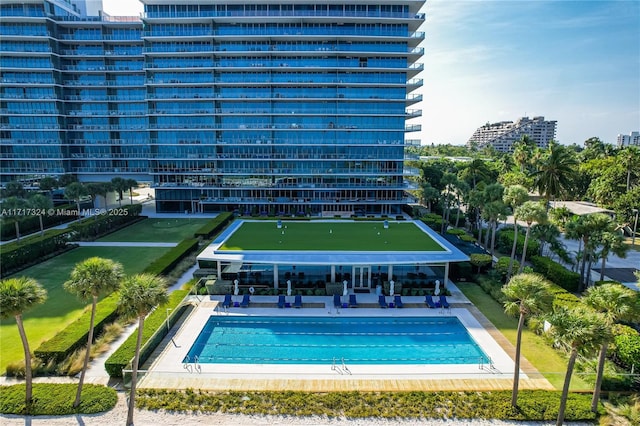 view of swimming pool with a patio area