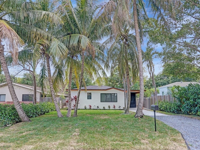 view of front of home with a front lawn