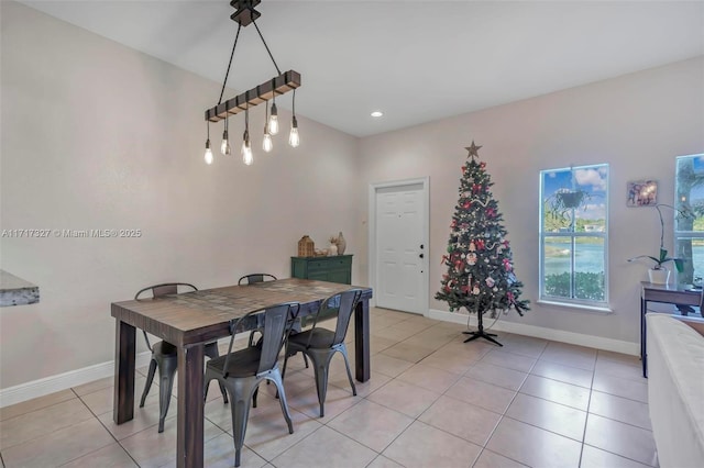 dining room featuring light tile patterned flooring