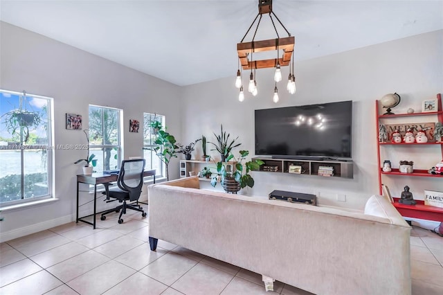 living room featuring light tile patterned floors and a wealth of natural light