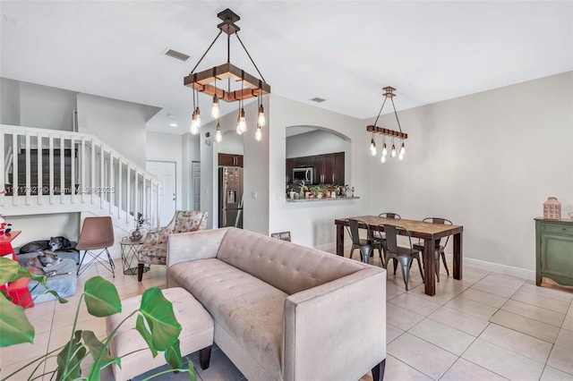 living room with light tile patterned floors