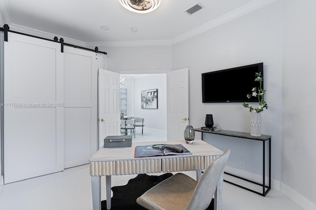 home office featuring a barn door and ornamental molding