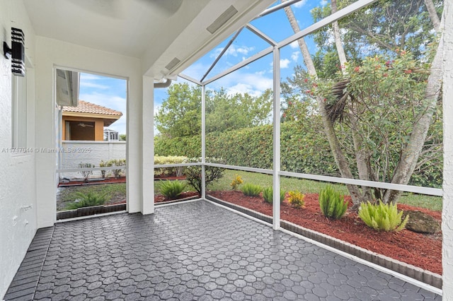 view of unfurnished sunroom