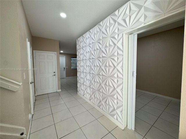 hallway with light tile patterned floors