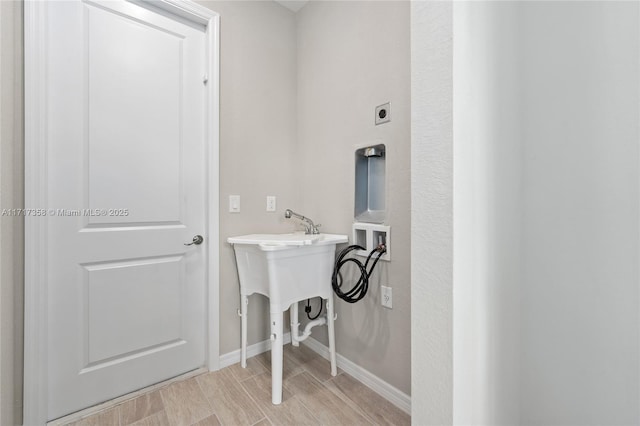 washroom featuring hookup for an electric dryer and hookup for a washing machine