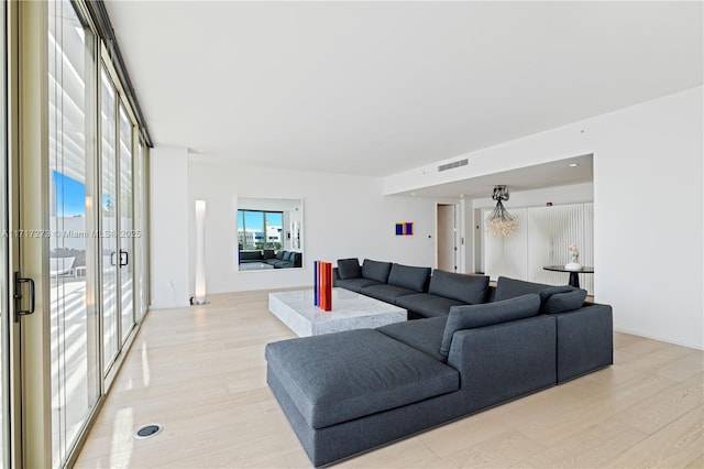 living room featuring light wood-type flooring