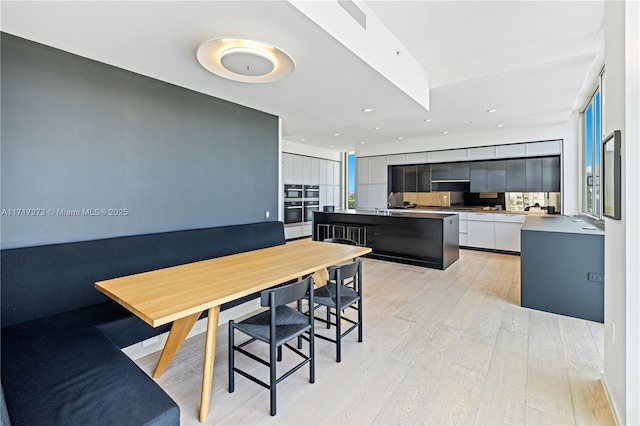 dining room featuring light hardwood / wood-style flooring