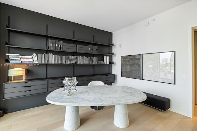 dining room with light hardwood / wood-style floors