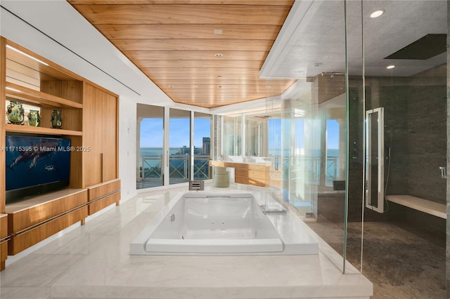 bathroom with floor to ceiling windows, wood ceiling, separate shower and tub, and built in features