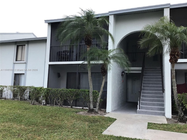 1013 Green Pine Blvd Unit C2, West Palm Beach, FL 33409 - view of property featuring stairs