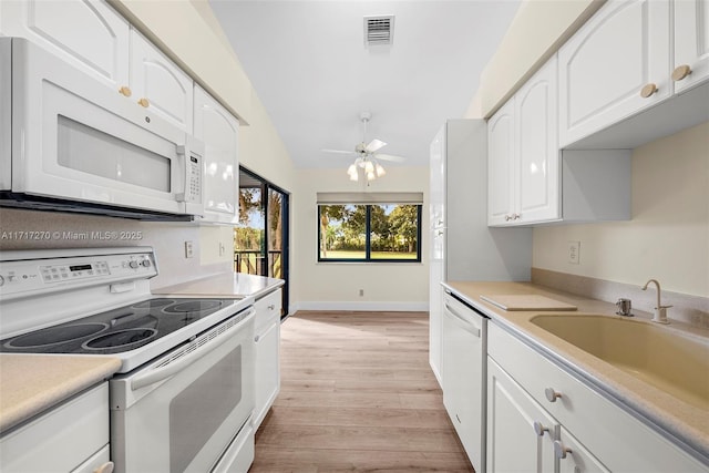 kitchen with ceiling fan, light hardwood / wood-style floors, lofted ceiling, white appliances, and white cabinets