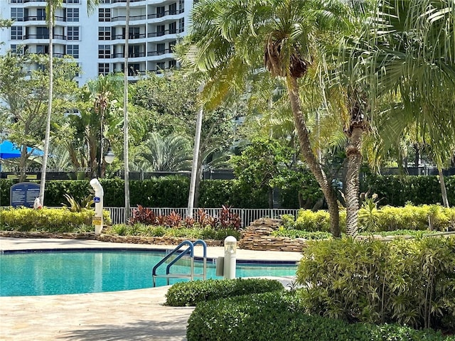 pool featuring fence