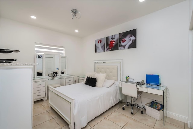 bedroom featuring light tile patterned floors