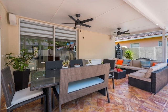 view of patio / terrace with an outdoor living space and ceiling fan