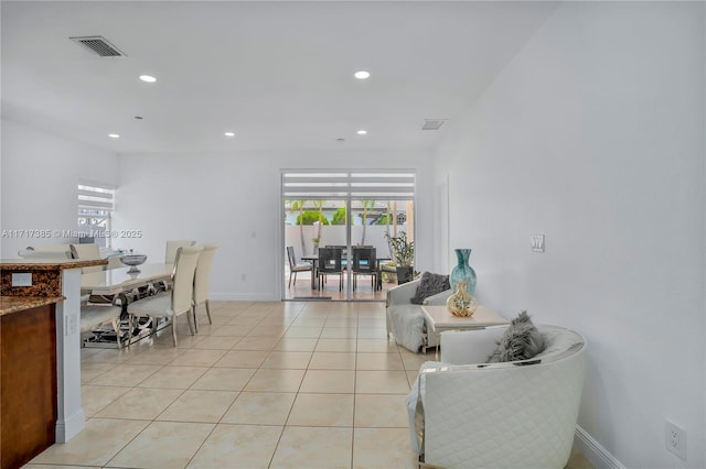 living room with light tile patterned floors