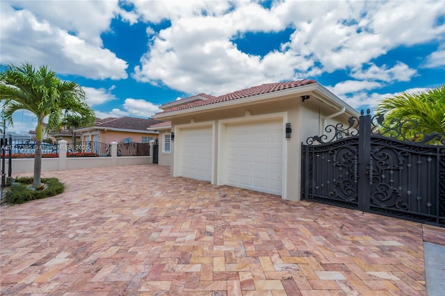 view of property exterior with a garage