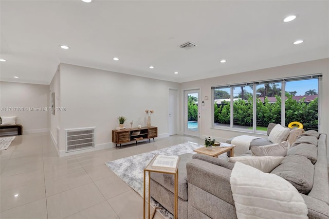 living room with light tile patterned flooring