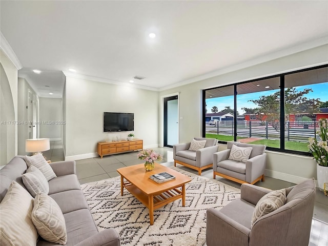 tiled living room with ornamental molding