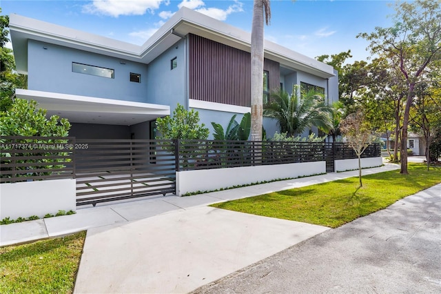 view of side of home featuring a carport