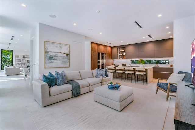 living room featuring sink