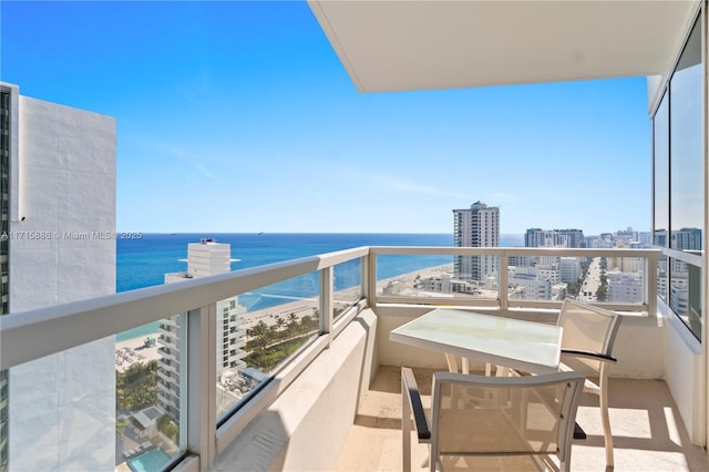 balcony featuring a water view