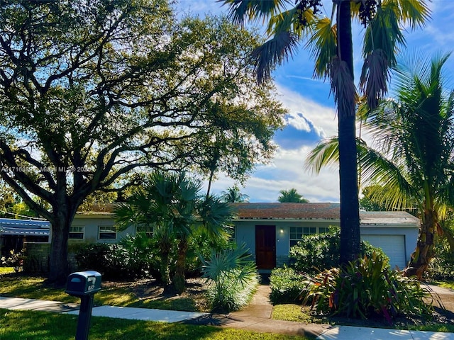 view of front of home featuring a garage