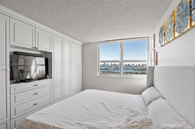 bedroom featuring a textured ceiling