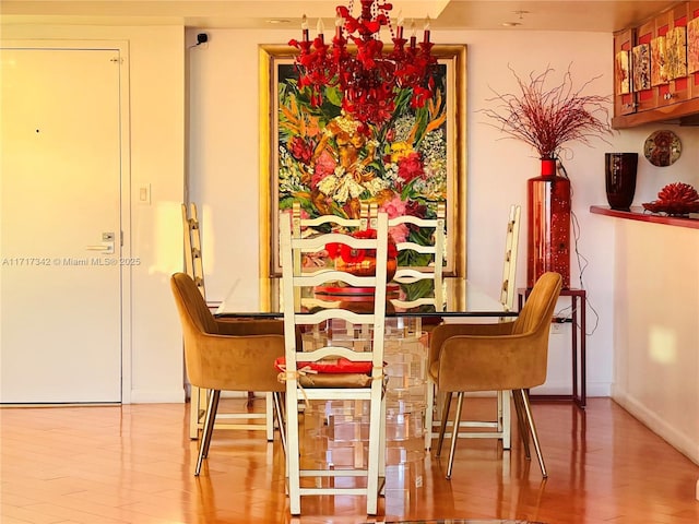 dining room with light hardwood / wood-style floors