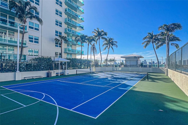 view of tennis court with basketball court