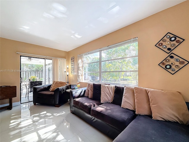 tiled living room with plenty of natural light