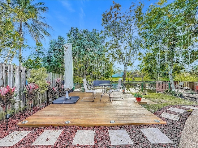 deck featuring a water view