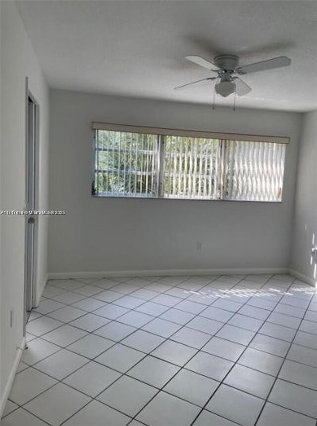 1020 94th St Unit 203, Bay Harbor Islands, FL 33154 - empty room featuring ceiling fan and light tile patterned floors