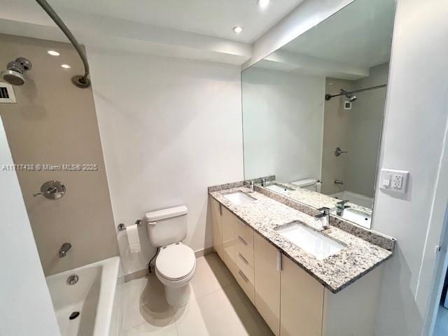 full bathroom with vanity, toilet, tile patterned flooring, and shower / bathing tub combination