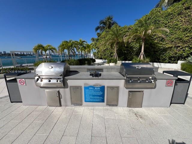 view of patio / terrace featuring an outdoor kitchen and area for grilling