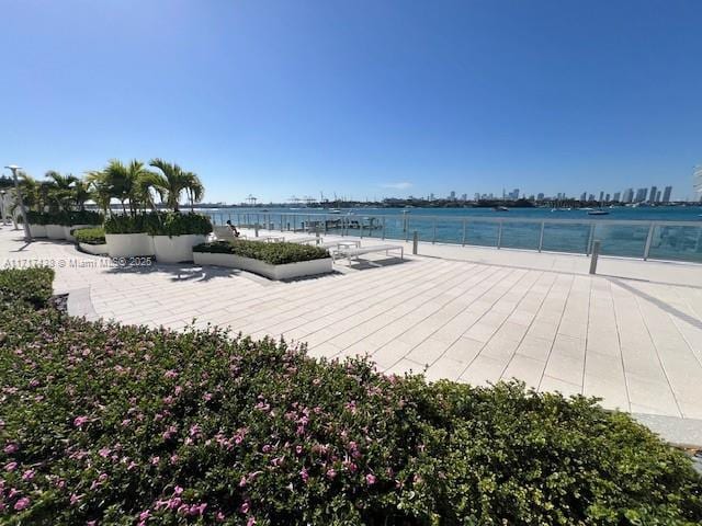 view of home's community with a water view