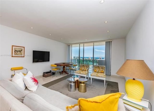 living room with floor to ceiling windows