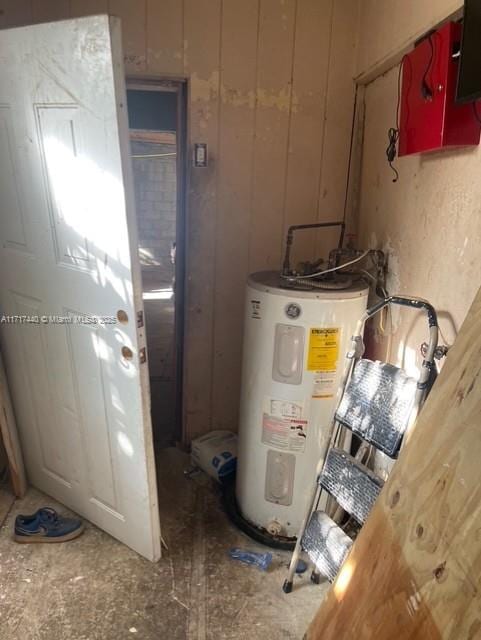 utility room with water heater