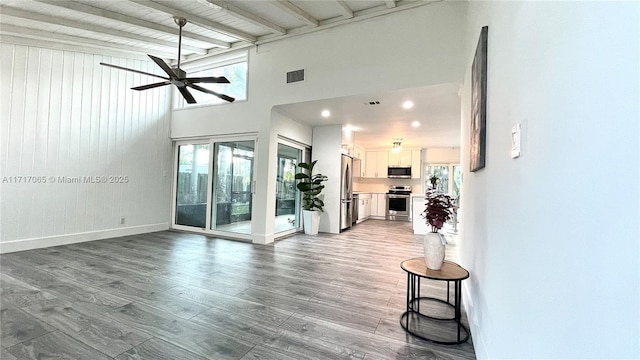 living room with ceiling fan and light wood-type flooring