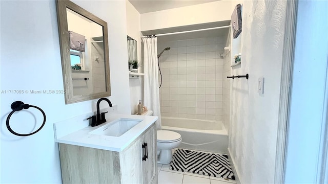 full bathroom with tile patterned floors, shower / bath combination with curtain, toilet, and vanity