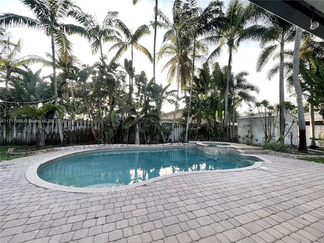 view of swimming pool featuring a patio