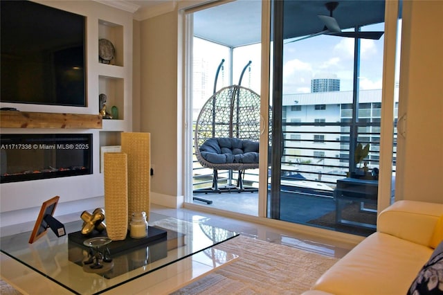 living room featuring tile patterned flooring, built in shelves, and crown molding