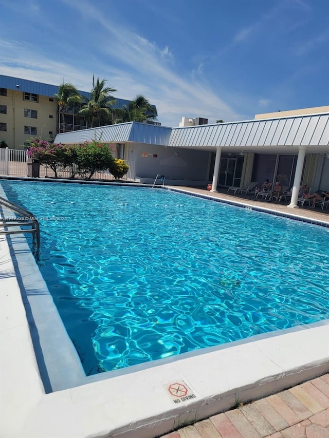 pool featuring fence