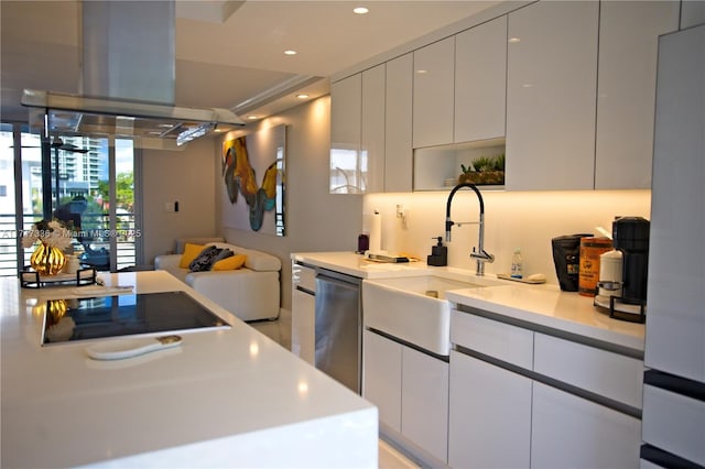 kitchen with dishwasher, sink, black electric cooktop, white fridge, and white cabinetry