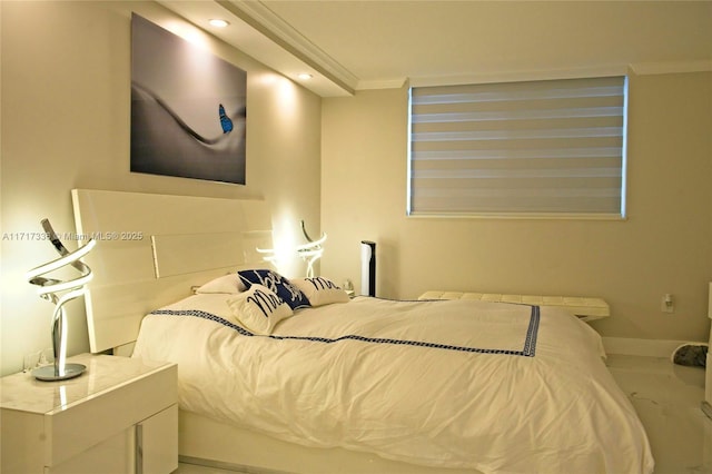 bedroom featuring ornamental molding and recessed lighting