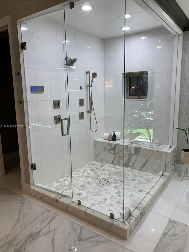 bathroom with an enclosed shower