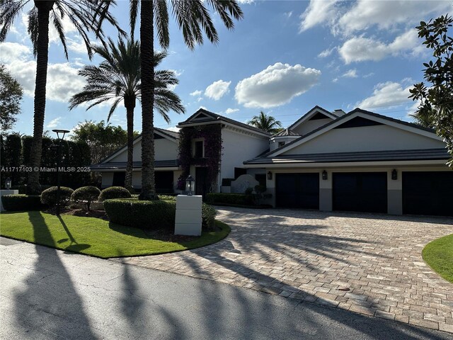 view of front of property featuring a garage