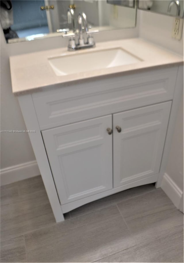 bathroom featuring vanity and tile patterned floors