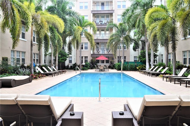 view of pool featuring a patio