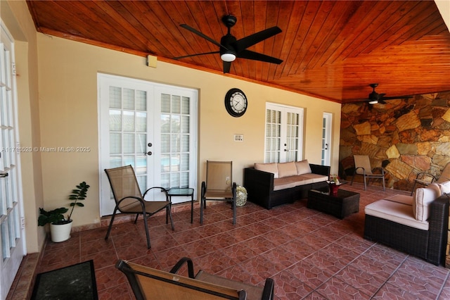 view of patio / terrace featuring an outdoor living space and french doors