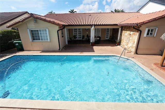 rear view of house with a patio